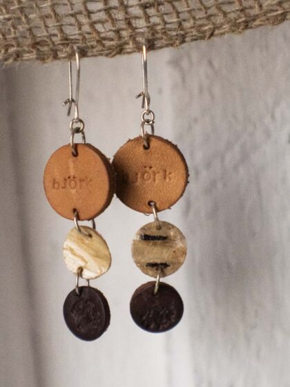 Earrings of leather and birch bark.