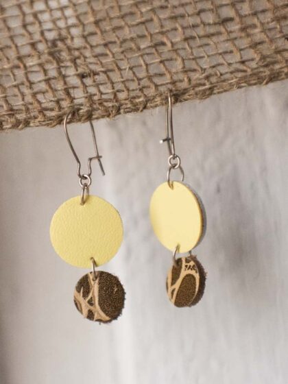 Earrings in yellow and brown leather.